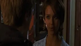 Jessica Alba showing cleavage while strapped to the top of