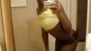 Ebony hottie films herself in the mirror