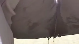 Chick lets hot pee trickle through pants