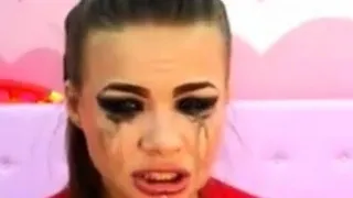 Cam Girl Deep Throats Dildo in Bondage