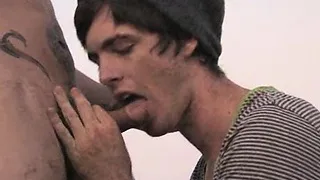 Two college boys get naked on a patio and fuck around.