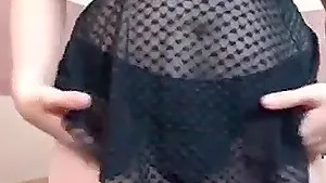 Curly brunette with enormous juggs teases and masturbates on livecam