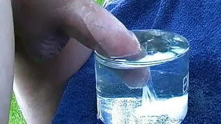 Drooling uncut penis ejaculates under water - big cum shot