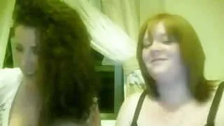 2 gilrs mucking about on webcam flashing tits