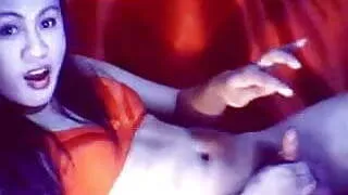 Nice asian tranny masturbes her cock and cums on webcam.