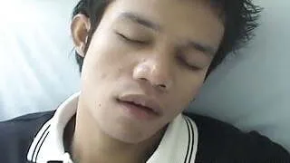 Asian twink rubbing his cock