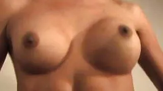 Sexy Asian ladyboy in a solo jerk show.