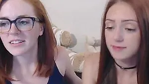 Two beautiful girls enjoy having a lesbian sex they kiss each other