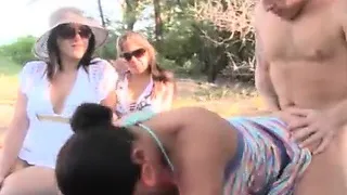 Naked guy fucks a girl on the beach