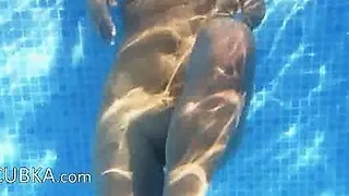 Underwater strip of charming boobs