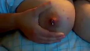 Got to love this bbw milking her tits..