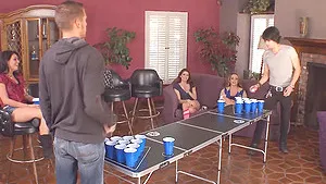 Sexy girls and guys like to play beer pong while they strip