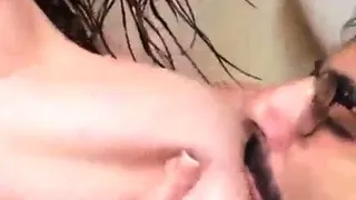 Busty brunette fingering her snatch close up