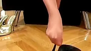 Stunning blonde in higt heels strips for your strips for your peasure