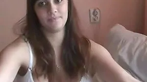 Hot pregnant girl teases her big belly and masturbates