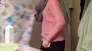 Hot babe strips in her bathroom just for you