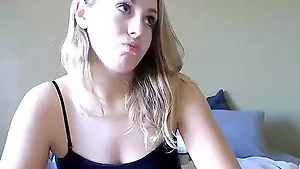 Blonde girl masturbates in front of her cam