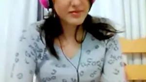 Horny Teen Stripteasing and masturbating on cam