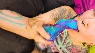 Tattooed model Illuz tests out her toys