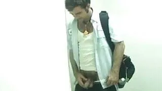 Pierced bear taking a leak in public