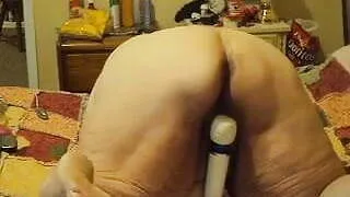 playing with wand doggy stile 