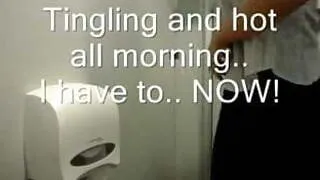 She rubs her cunt in a public bathroom