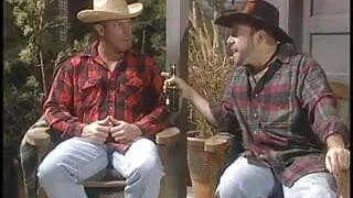 Guy in cowboy outfit gets BJ