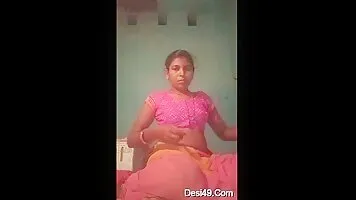 A horny Desi Bhabhi shows off her tits and jerks her pussy with her fingers