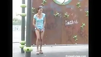 Woman pissing in the street