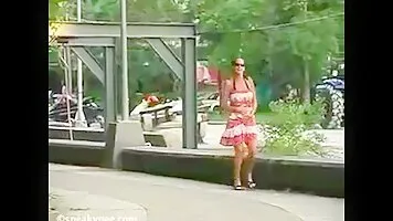 Shameless chick pissing on the street