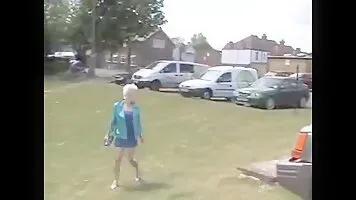 Short-haired girl pissing on track