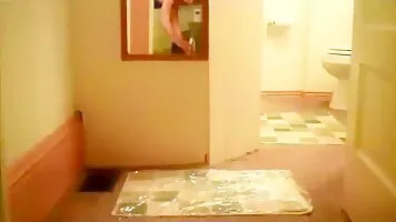 Tattooed chick shit in the mirror