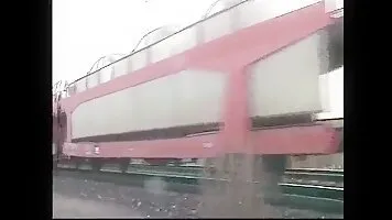 The girl shit and pissing on the railway