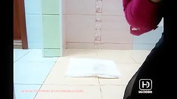 The girl took off her black tights and a scat on white bag