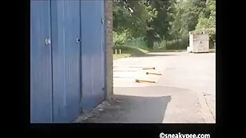 Titted Asian peeing near the garage