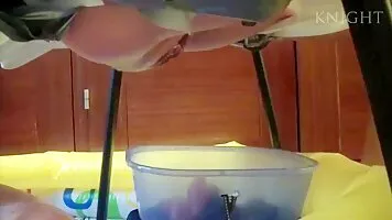 Two girls scat in the mouth and face of a man