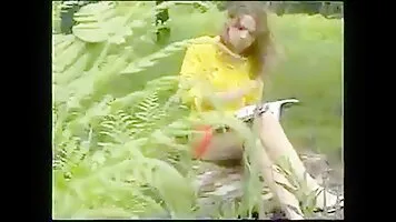 Pissing girls in bright clothes