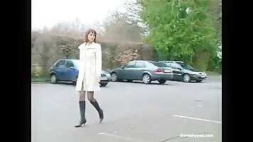 Pissing woman in a white coat