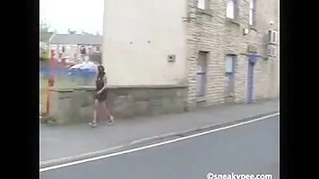 Mulatto pissing in the street