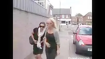 One girl pissing, another down to ride