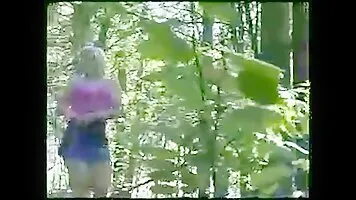 Jana peeing in the woods