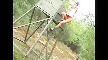 Girl with a pierced clit in scat from a height