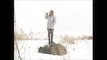 Girl with big tits pissing in the winter