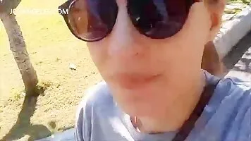 Girl with glasses pooping in the toilet