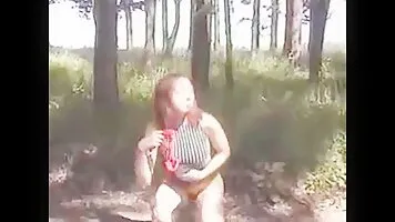 Girl with unshaven pissing pussy