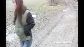 Girl shit and pissing on a bench by the stone wall
