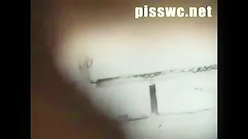 Girl pooping in beach toilet