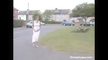 Girl pee on the doorstep