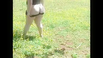 Fat woman shit in a clearing