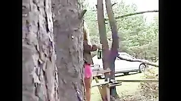 Beautiful girl pissing sitting on a bench